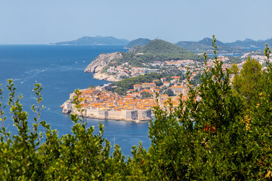 Dubrovnik, Croatia 07-29-2023 The UNCESO world heritage old town of Dubrovnik with spectacular views from the fortified walls over the old town with red roof tops, narrow streets and the Adriatic sea.