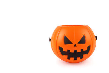 halloween pumpkin to put candy in on white background