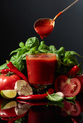 Tomato sauce with ingredients.