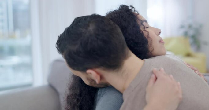 Love, forgive or couple hug in home living room bonding together to relax on holiday with support or trust. Intimate embrace, sorry or romantic man with a woman with empathy or peace in marriage