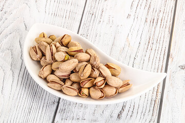 Salted tasty pistachio nuts heap