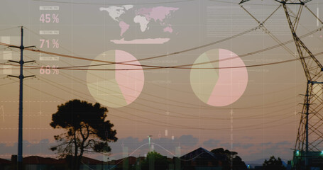 Naklejka premium Image of financial graphs and data over electricity poles at sunset