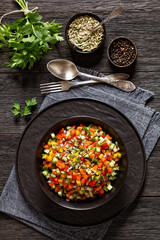 Israeli salad of finely diced veggies in bowl