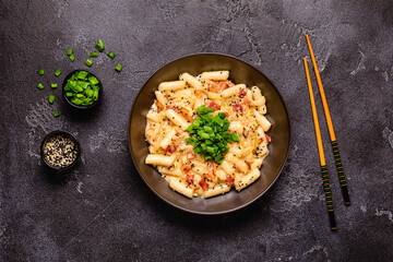 Spicy Rice Cake with Cheese and Bacon or Cream Teokbokki, Tteokbokki.