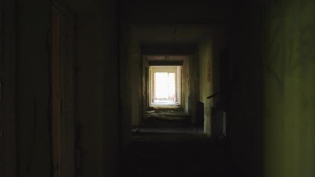 Dark corridor in an abandoned building 4k