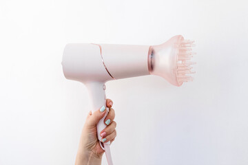 Professional hair dryer with a nozzle diffuser for curls