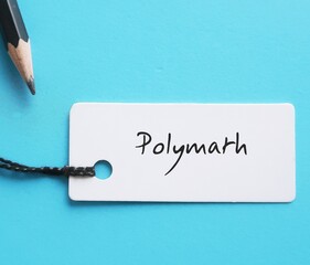 Pencil wrote on a paper tag POLYMATH  - someone with extensive knowledge in various subjects -...