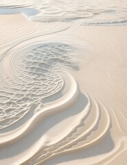 A sun-bleached sand floor, with intricate patterns of ripples and swirls