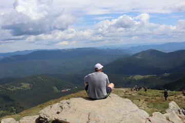 Fototapeta premium hiker on the top of mountain