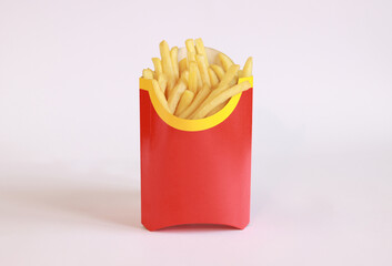 Fried potatoes in a red cardboard box on a white background. Fast food. French fries in paper packaging