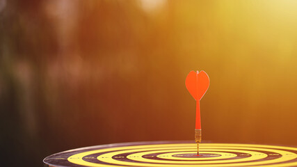 Red dart hit to center of dartboard. Concepts of Business marketing goal, Successful business....