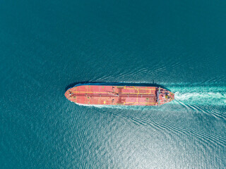 Aerial view of freight ship with cargo containers