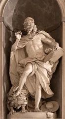 Tuinposter GENOVA, ITALY - MARCH 7, 2023: The statue of St. Jerome in the church Basilica di Santa Maria Assunta by Diego Carlone (1740). © Renáta Sedmáková