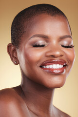 Beauty, makeup and face of a black woman in studio for self care, skincare and cosmetics. Headshot of african person or aesthetic model with facial shine, dermatology and glow on a beige background