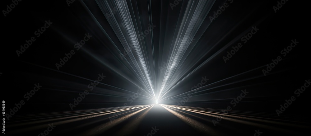 Poster close up view of a light ray on a black backdrop