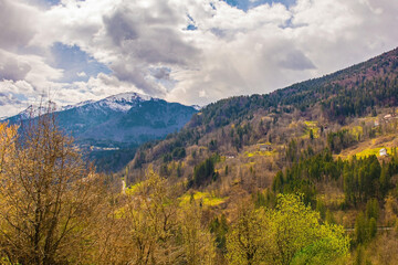 The early spring alpine landscape around the village of Mieli in Carnia, Udine Province, Friuli-Venezia Giulia, north east Italy
