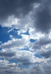 Obraz premium cloudy sky. white and fluffy clouds with a blue background.