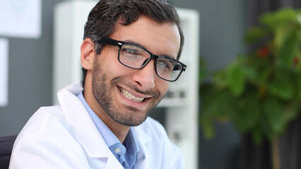 Confident male doctor in a research center close-up