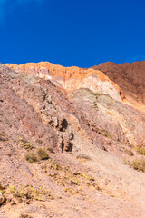 HILL OF SEVEN COLORS IN PURMAMARCA. HUMAHUACA, JUJUY. ARGENTINE NORTHWEST. FAMOUS TOURIST PLACE.