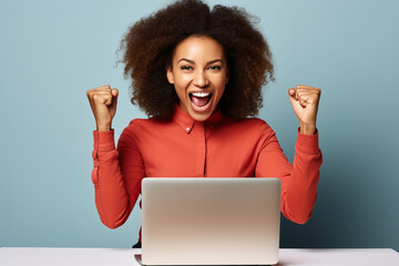 Excited happy african american woman feeling winner rejoicing online win got new job opportunity, overjoyed motivated mixed race girl student receive good test results on laptop celebrating admission