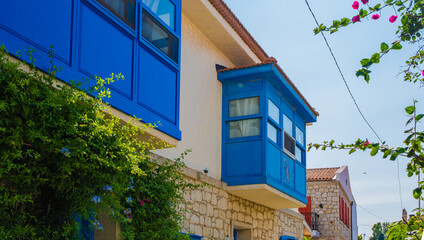 Fototapeta na wymiar Colorful Houses with Bay Window in Alacati, Izmir