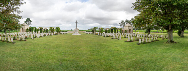 Ryes, France - 07 24 2023: Bazenville British Military Cemetery. View of Memorial and the white...