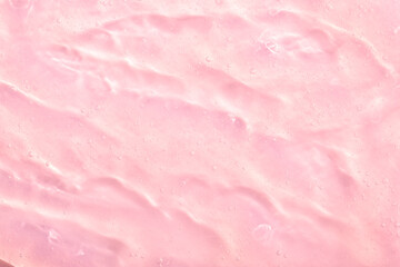 Cosmetic gel, serum transparent sample. Liquid cream with bubble texture. Gel texture of a cosmetic product. Clear liquid lotion for skin care.