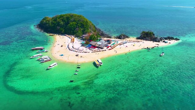 High angle view of Koh Khai Nok, Khai Nai, white beach and blue sea with tourists on holiday in Phuket, Thailand.