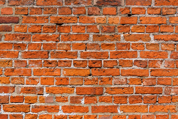 red brick wall in the historical part of the old city in europe as a background 35