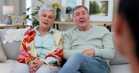 Senior couple on couch, therapy with doctor and consultation with mental health professional for support. Therapist, old man and woman in marriage counselling with conversation, advice and retirement