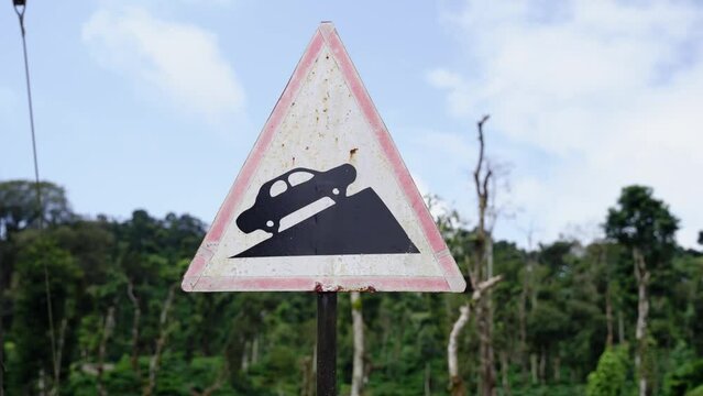hill road ahead sign board.
