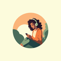 woman sitting listening to music on headphones using cell phone