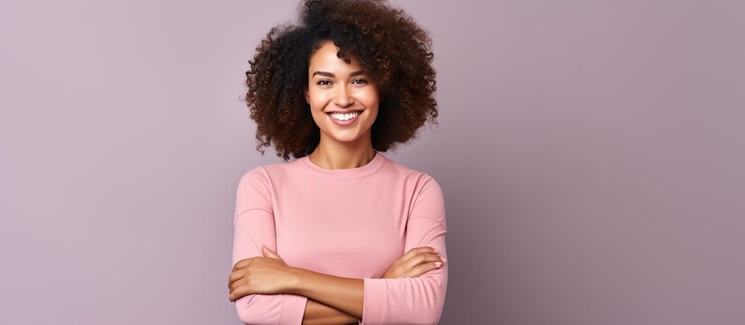 Smiling biracial female assistant celebrates Teaching Assistants Day - Powered by Adobe