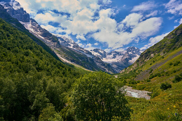 panorama of summer mountains with waterfalls
