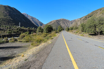 Naklejka premium Road in the Andes pre-cordillera, in the region of San Clemente, Maule, Chile 