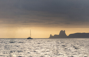 The island of Es Vedra in Ibiza illuminated by a beautiful sunrise