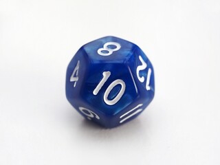 D12 blue 12 sided dice isolated on white. RPG dice. Dodecahedron DND dice  - obrazy, fototapety, plakaty