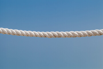 Hemp rope old dried on background of blue sky
