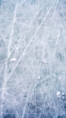 Ice background with marks from skating and hockey, blue texture of rink surface with scratches