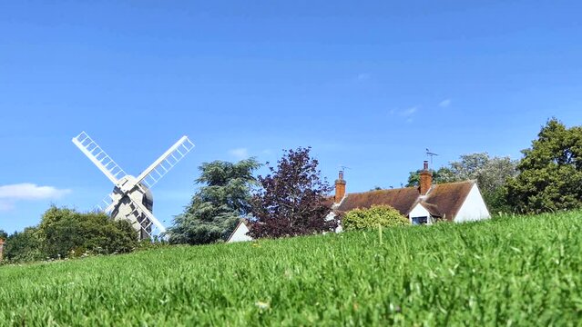 Low angle view of Post Mill and meadow.

Known as the most photographed village in Essex, Finchingfield is home to one of the county's few remaining windmills and is a charming, picturesque village.