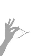 vertical banner mock-up for nail beauty master or salon. cuticle trimmer isolated on white background Shadows from female hands hold manicure cuticle trimmer.  