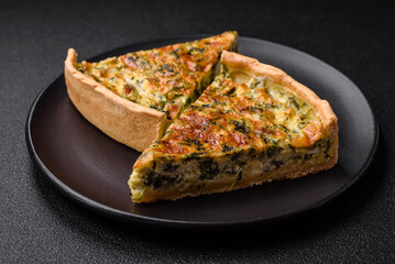 Delicious fresh quiche with broccoli, cheese, spices and herbs cut into pieces