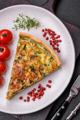 Delicious fresh quiche with broccoli, cheese, spices and herbs cut into pieces