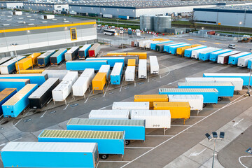 Aerial view of trucks in a distribution center, a large logistics center