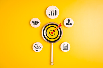 Magnifying glass with target business icons, Business strategy planning management, Progress of business and analyzing financial investment data, Business process and workflow development