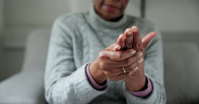 Senior woman, hands and arthritis in closeup, massage and physical therapy for injury in nursing home. Elderly person, joint pain or osteoporosis with retirement in house, rub and stretching fingers