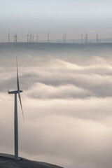electric power generation from windmill wind farm - obrazy, fototapety, plakaty