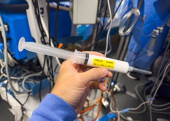 Hospital tools like syringes, drugs, and IV fluids encapsulate healing and peril. They embody opioid crisis, treatment, and intervention, their potency evident in fentanyl, propofol, vasopressors