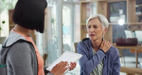 Tablet, shoulder pain or physiotherapist with old woman with help in physical therapy rehabilitation. Elderly, typing or senior patent explaining muscle injury accident to chiropractor for wellness