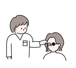 眼科で検査する医療従事者　視能訓練士　看護師